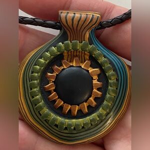 Preowned like new polymer clay pendant handmade